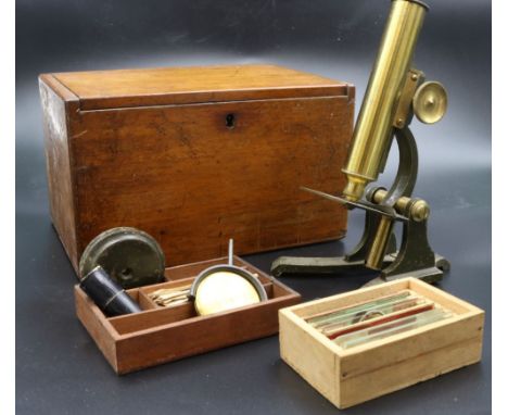 A 19th century brass microscope by J T Slug Manchester