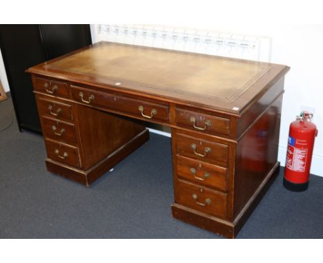 Tan inlaid Edwardian pedestal desk with dovetails in mahogany on ceramic castors, which dismantles into 3 sections for ease o