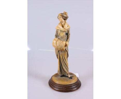 A Resin "Costume Passion" Figurine of a Lady with Signatures on a wooden mount. Dated "1913", which refers to the ladies clot