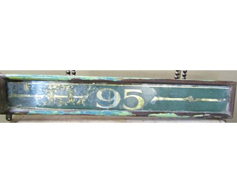 19th century glass and gilt panel for the number '95' within a partially stripped mahogany framework, 16 cm x 95 cm approx 