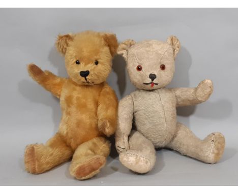 2 small vintage teddy bears, both with jointed body, pronounced nose, slightly humped back, stitched nose and mouth; one has 