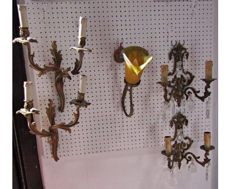 A pair of gilt finished Rococo style wall lights with two branches, another pair Georgian style with glass pendants, and a si