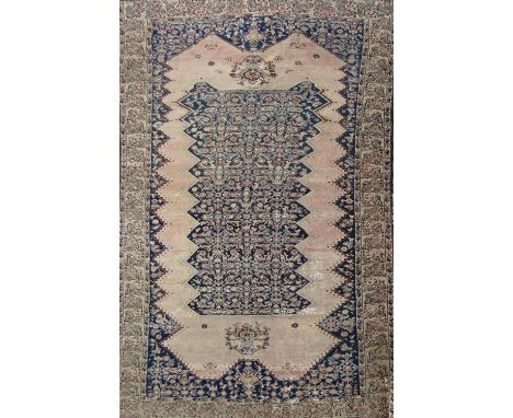 A Middle Eastern rug with a central stepped panel within a larger stepped border 206cm x 120cm and another very faded Middle 