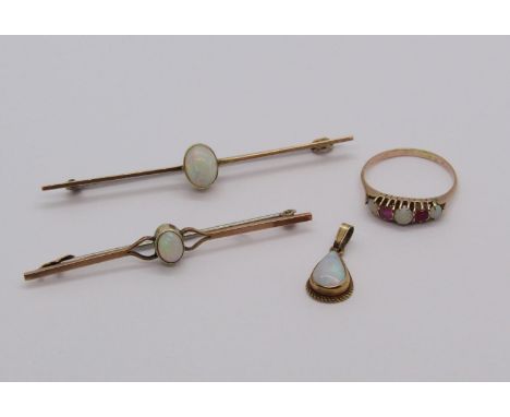 Four pieces of 9ct cabochon opal set jewellery; two bar brooches, a pear cut pendant and a five stone ruby and opal ring, siz