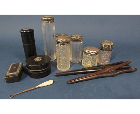 Six silver capped dressing table jars, a pair of ebony glove stretchers, an ebony trinket box, etc 