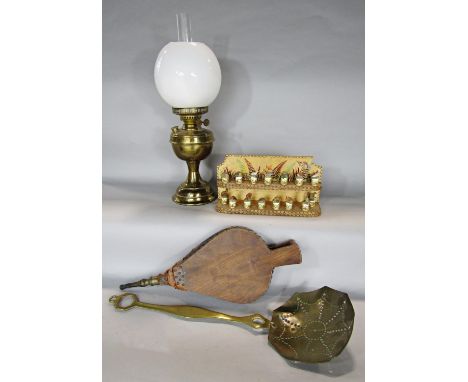 A brass Duplex oil lamp with a white opaque shade, a brass skimmer, a pair of leather bellows and a collection of china thimb