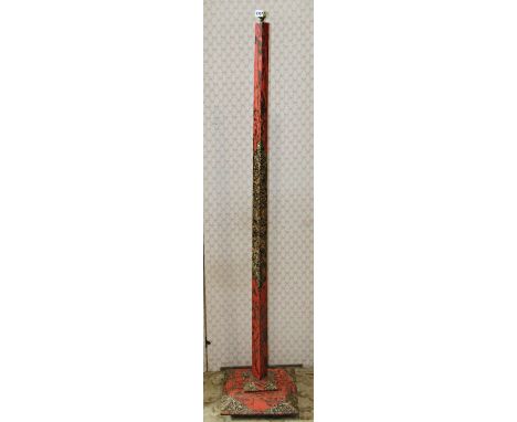 A wooden standard lamp with square cut stem and platform base with all over decorative marble effect lacquered finish 