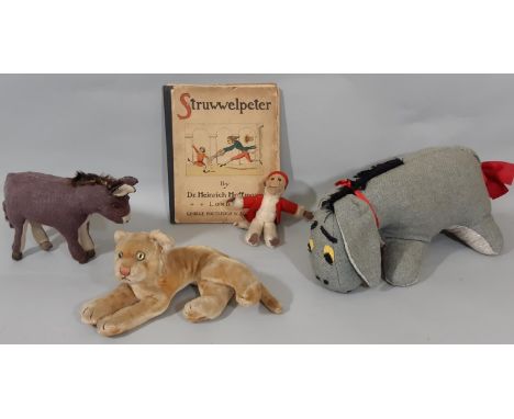 Collection of vintage soft toys including a Norah Wellings monkey with belhop clothing, height 16cm, a Steiff type lion cub, 