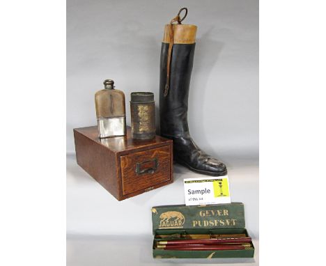 Hunting, shooting, fishing, in the form of a pair of black riding boots with shoe trees, a brown leather gun case, two vintag