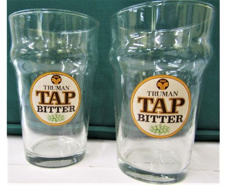 A large collection of branded drinking glasses, various sizes and styles to include beer/larger brands such as Clausthaler, C