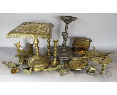 Brass ware including, kettle stands, candlesticks, fire tools, Alladin's lamp, ash trays etc and a silver plated cherubic can