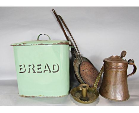 A green enamel bread bin, a copper tankard, a brass candle stick, etc. 