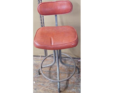 A vintage office chair in steel with adjustable framework with later upholstered seat and back panel 