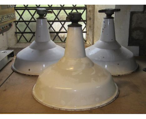 A set of three vintage industrial enamel hanging ceiling/pendant lights with dome shades, one with applied label Benzamin 48 