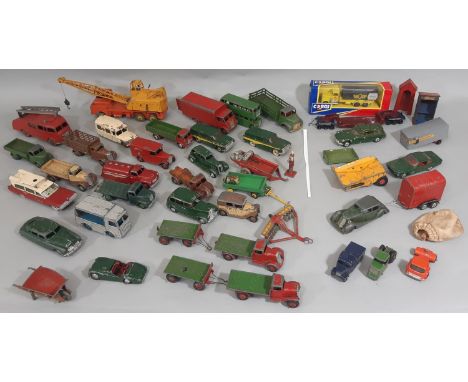 Collection of unboxed Dinky model vehicles including 2 Ton Lorry Mounted Crane 972, Fire Engine, Manure Spreader, Disc Harrow