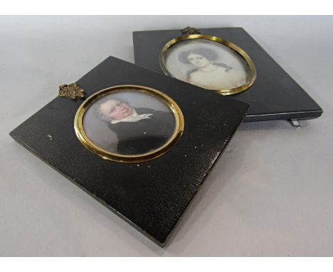 An early 19th century miniature portrait on ivory, middle aged gentleman in black coat and white cravat, together with a furt