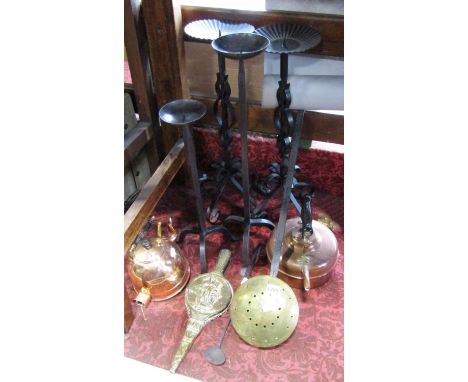 A pair of wrought iron candlesticks 59 cm high, a further two similar candlesticks, an electric copper kettle, a copper kettl