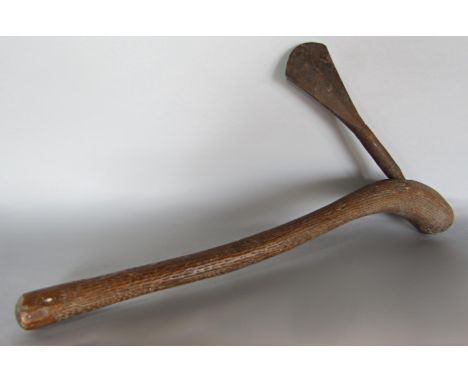 An antique West African Chokwe axe with incised handle and iron decorated blade. 49cm. 