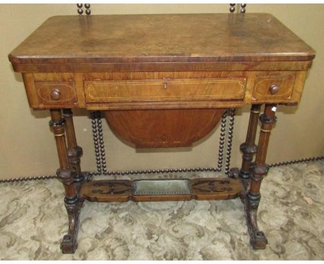 A Victorian figured walnut foldover top card/sewing table or rectangular form, the card table with marquetry inlaid detail, t