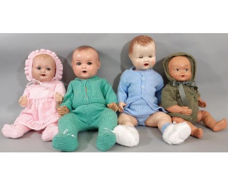 4 vintage baby dolls from 1930's-1950's all with 5 piece bent limb body, closing eyes and moulded hair and wearing knitted cl
