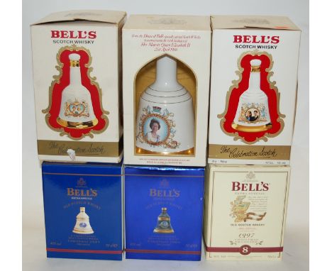 Six various boxed Bell's commemorative Scotch Whisky decanters, being Christmas decanters for 1997, 2001, 2004, and Royal Wed