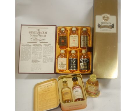 Blue Nun Gold 1983, in presentation tin, one bottle; The Whyte & Mackay Scotch Whisky collection of six miniatures in present