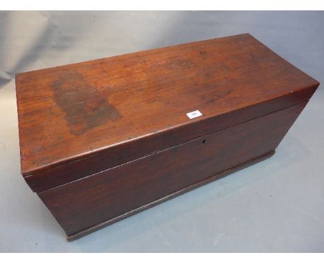 A mahogany carpet trunk.