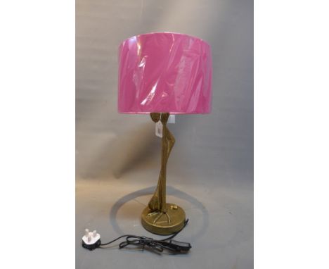 A contemporary table lamp in the from of flamingo legs