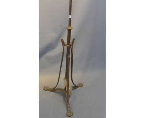 An Art Nouveau brass standard lamp. 