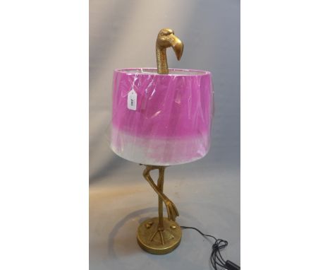 A contemporary table lamp in the from of a flamingo 