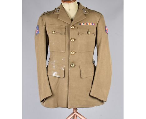 A War period British Artillery jacket, AF, with Lieutenant epaulettes and British Commonwealth Forces patch to the arm, plus 