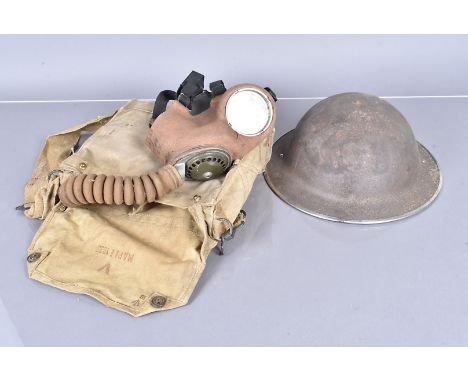 A WWII British Brodie helmet, dated 1939, with liner, af, together with a 1938 dated General Service Respirator (GSR) possibl