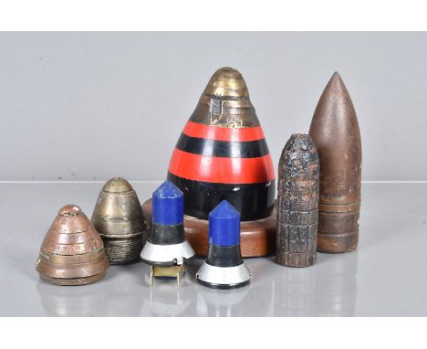 A group of fuses, comprising a No.85 timer fuse, a No.101, a large No.83 fuse on wooden stand, plus a small selection of othe