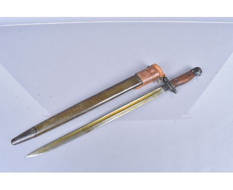 A 1907 Pattern SMLE bayonet by Wilkinson, dated '18, complete with scabbard and leather frog/hanger, stamped with broad arrow
