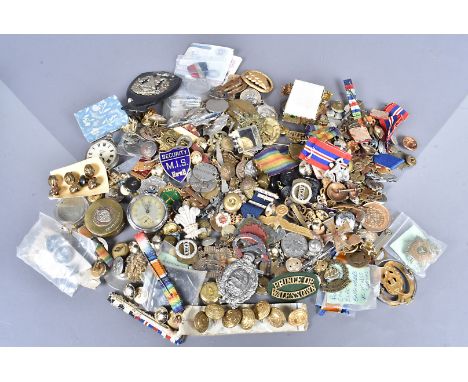 A large collection of various items, to include, badges, buttons, two Service Army pocket watches, medallions, and much more 
