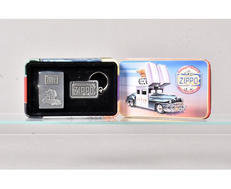 The Zippo Car, a 1998 Limited Edition Zippo lighter set, comprising a brushed chrome lighter with applied Zippo Car decoratio