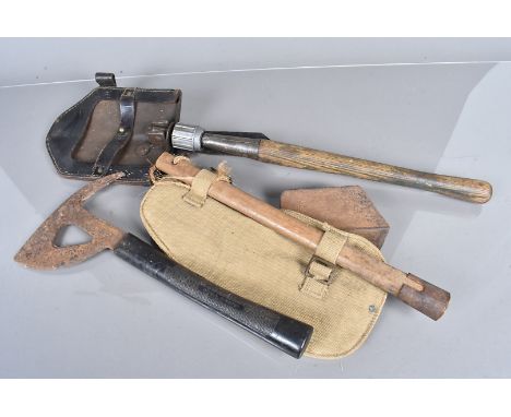 Tools, a 1944 stamped entrenching tool, complete with carry case, together with a later entrenching tool, plus a an Air Force