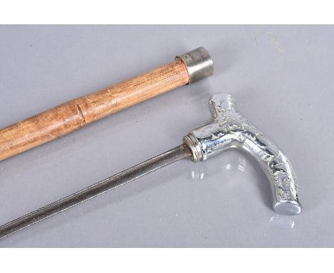 A sword stick, with white metal handle, screw top reveals 75cm long blade, in the stype of a T-back with single fuller 