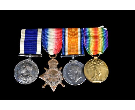 A WWI Royal Navy medal group, awarded to Chief Stoker William Thomas Barnett (279914), who was on HMS St George, medals compr