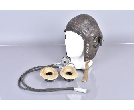 A WWII period Type-C flying helmet, AF, with indistinct markings to the liner, the rubber ear pieces perished, together with 