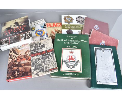 A small collection of military related books, to include British Army Badges of the Twentieth Century, Britain At War, The Zu