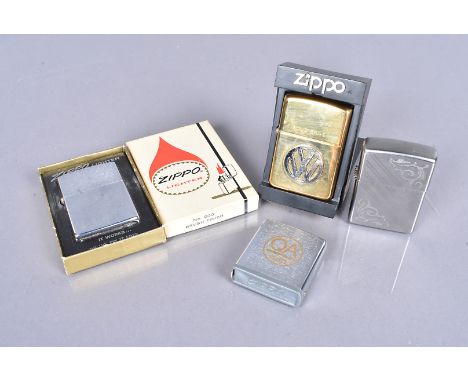 A 1984 brushed aluminium Zippo lighter, with original retailer's box, together with a 1995 solid brass VW Zippo with case, a 