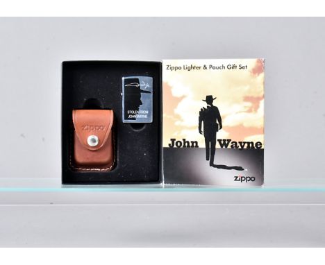 Stolen From John Wayne, 2007 Zippo Lighter and Pouch gift set, containg a brushed chrome Zippo lighter and leather (ammunitio
