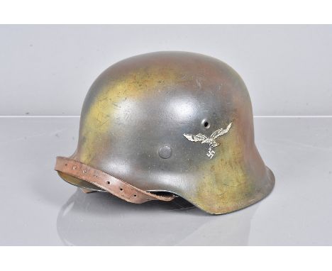 A WWII period M42 German Luftwaffe single decal helmet, with eagle decal to the left side, with Normandy Camo, stamped 3849 t