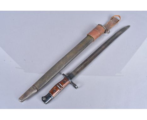 A 1917 Pattern US Remington bayonet, complete with scabbard and 1940 British leather hanger, blade AF 