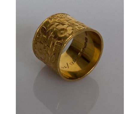 A 22ct yellow gold profusely etched scarf toggle or ring, 19mm internal diameter, 16mm H, hallmarked for London, 1965, 15g