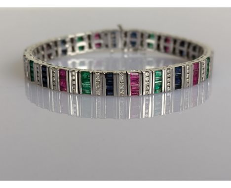 A diamond, sapphire, ruby and emerald rainbow or 'Tutti-Frutti' bracelet designed in alternating rows of four baguette-cut pr