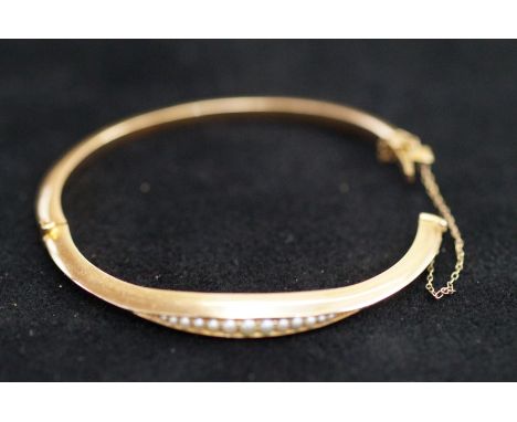 9ct Gold bangle set with seed pearls &amp; safety chains, Total weight 8.5g