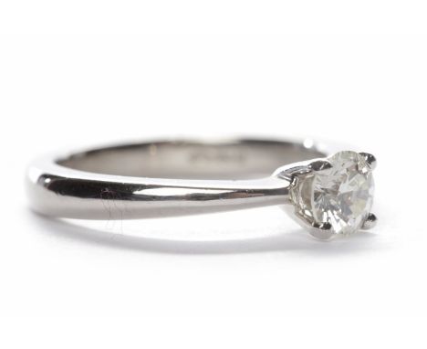 DIAMOND SOLITAIRE RINGthe round brilliant cut diamond of approximately 0.51 carats in platinum, size L-M