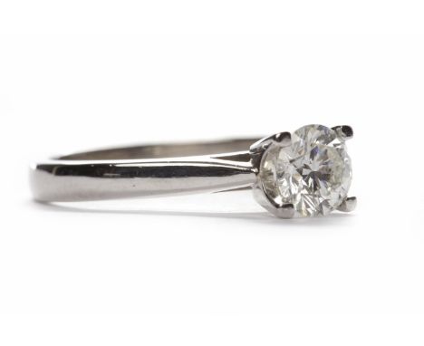 DIAMOND SOLITAIRE RINGthe round brilliant cut diamond of approximately 0.74 carats in platinum, size M-N